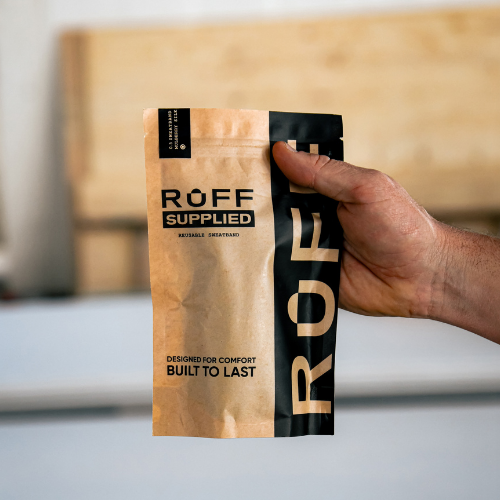 Customer holding the Ruff Supplied sweatband packaging