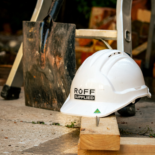 Hard hat on sitting on timber with fitted Ruff Supplied sweatband