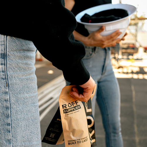 Customer holding the Ruff Supplied sweatband packaging
