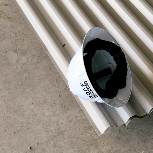 Hard hat on sitting on timber with fitted Ruff Supplied sweatband